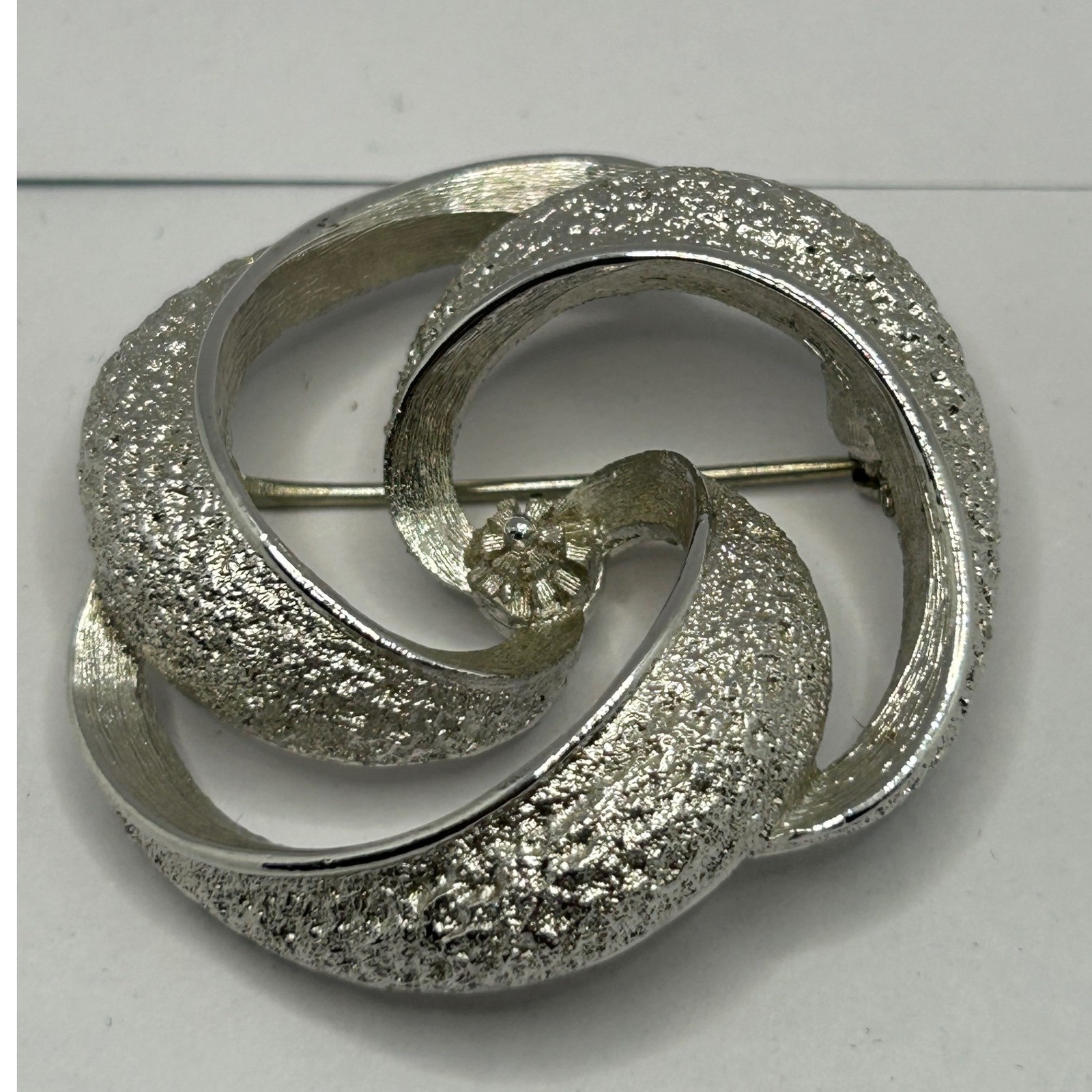 Vintage Monet Swirl Brooch Silver Tone Textured Knot Twist Pin Classic Timeless